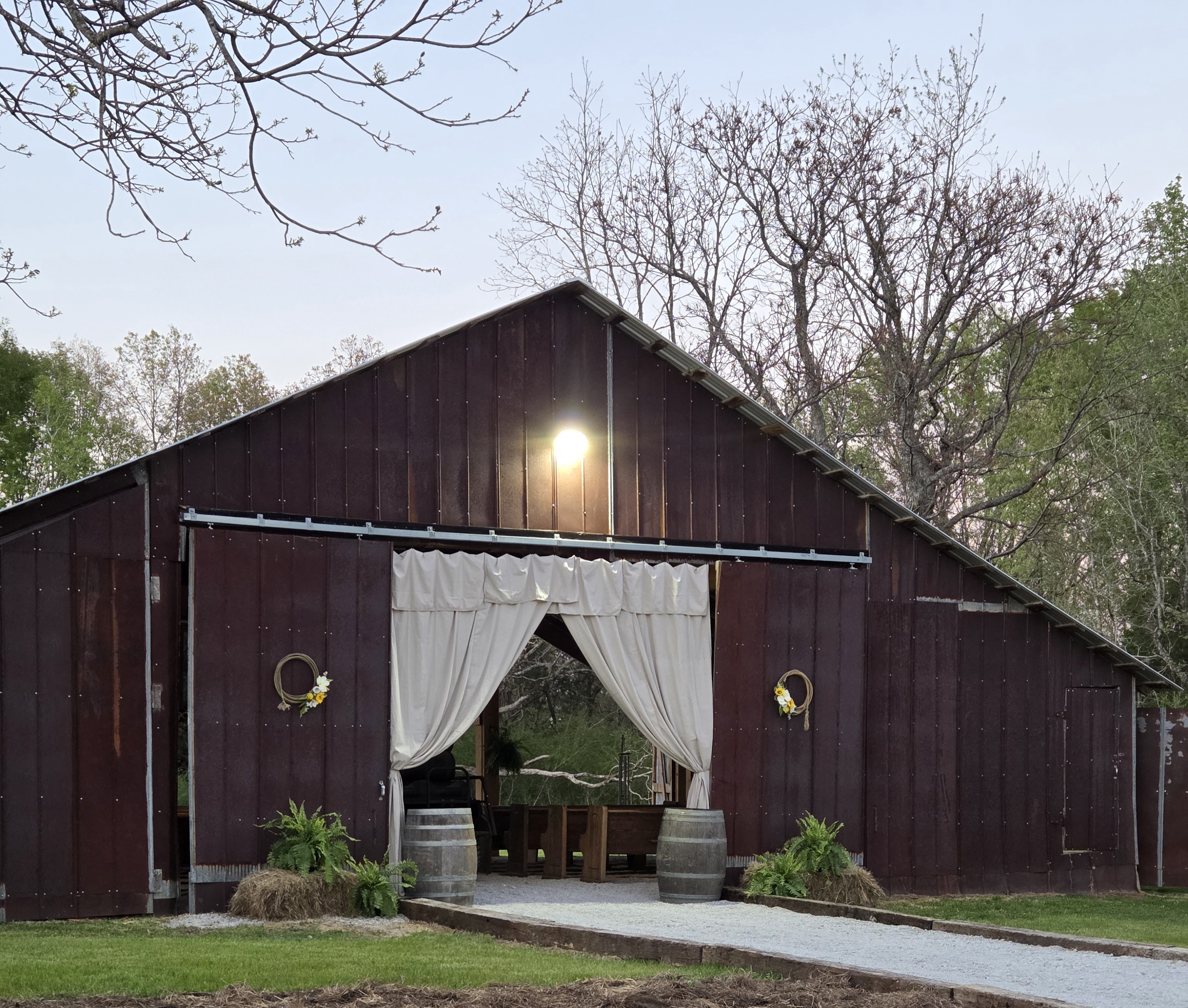 The Raelyn barn ceremony space at dusk